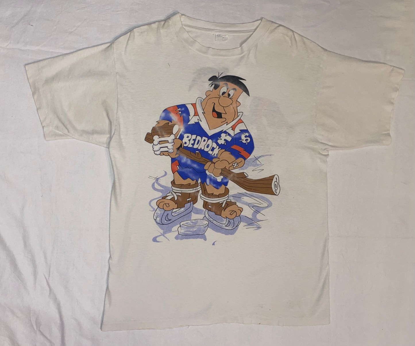 90s Fred Flintstone "hockey player" vintage shirt