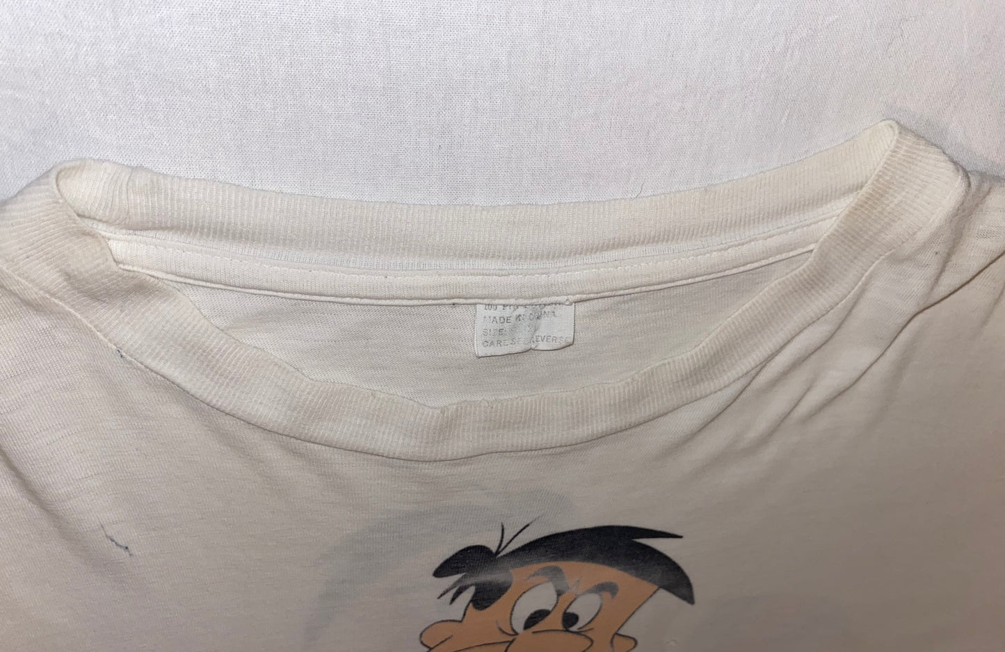 90s Fred Flintstone "hockey player" vintage shirt