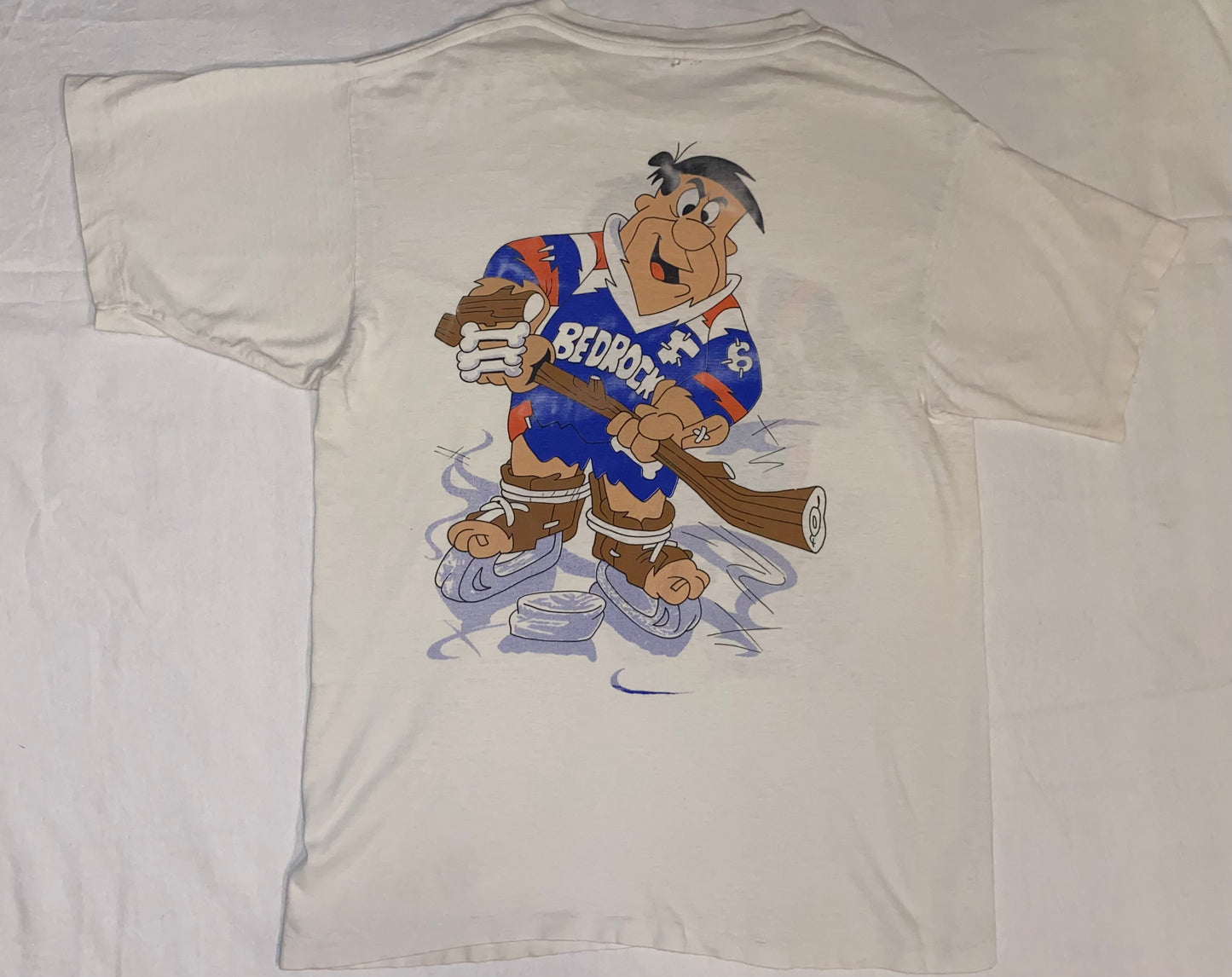 90s Fred Flintstone "hockey player" vintage shirt